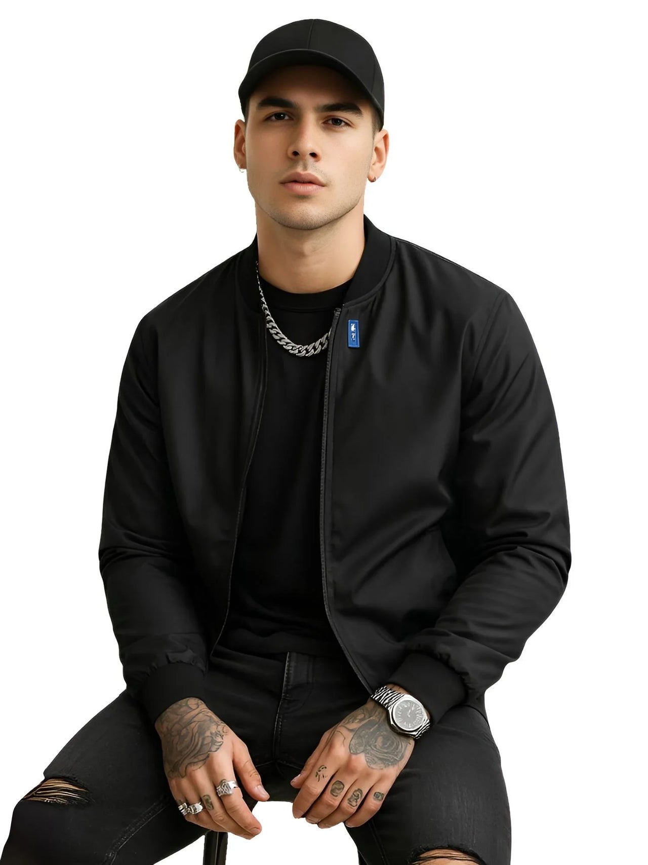 Man wearing a black jacket and cap on a white background