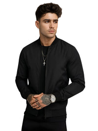 Thumbnail for Man wearing a black bomber jacket on a white background