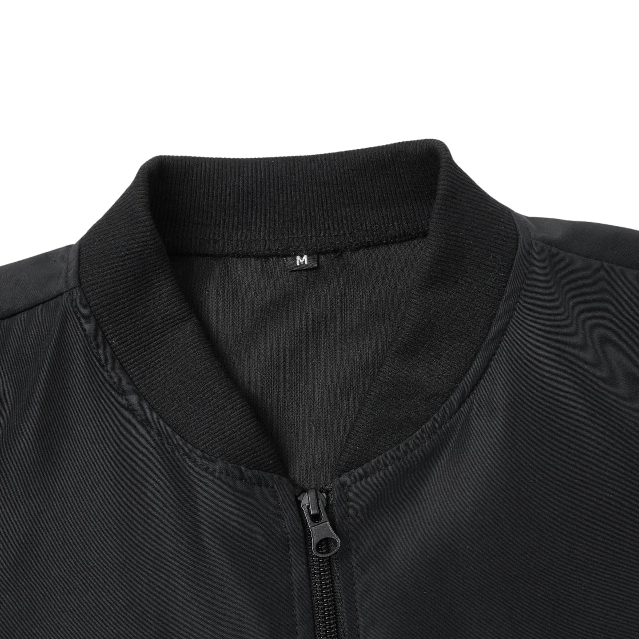 Close-up of a black jacket collar with a zipper on a white background