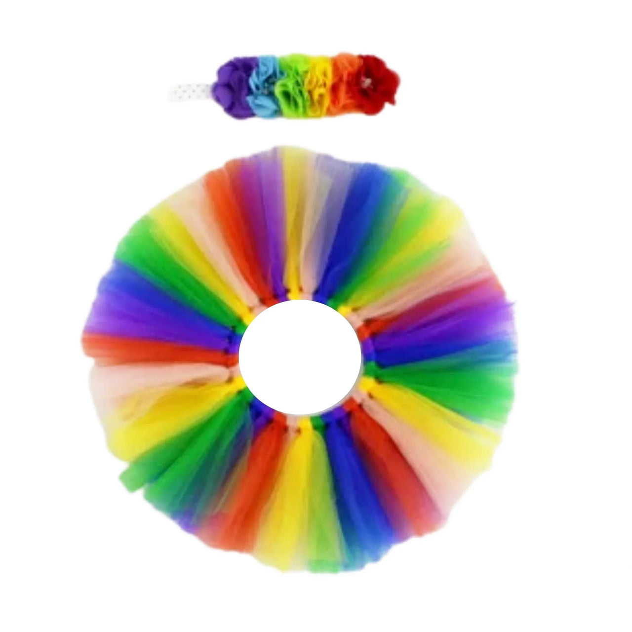 Rainbow-colored tutu and hair tie on a white background