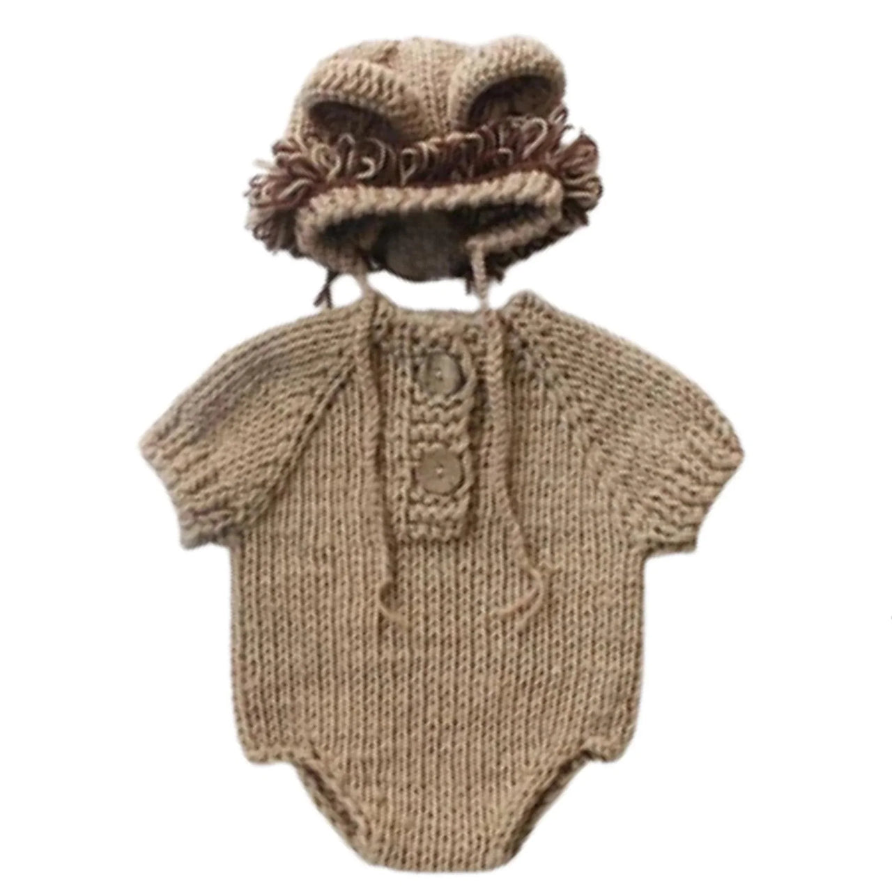 Knitted baby romper and hat set on a white background