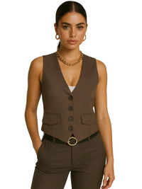 Thumbnail for Woman wearing a brown vest and pants with a white background