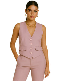 Thumbnail for Woman wearing a pink vest and pants set on a white background