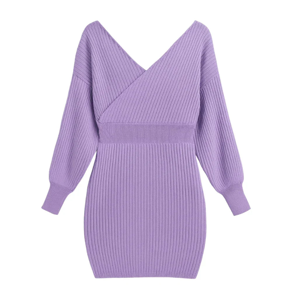 Purple sweater dress on a white background
