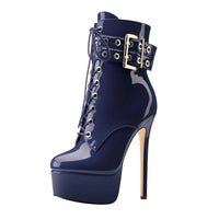 Thumbnail for Navy blue high-heeled boot with strap and buckle on a white background