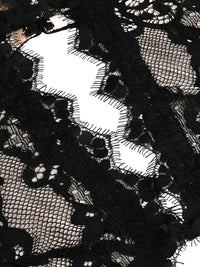 Thumbnail for Close-up of black lace fabric with floral patterns