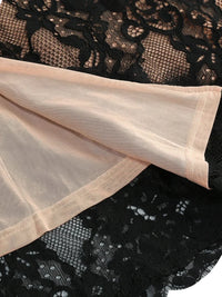 Thumbnail for Close-up of black lace fabric with beige mesh lining