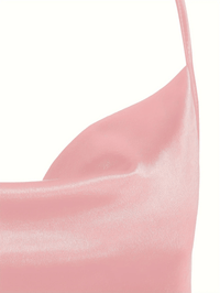 Thumbnail for Close-up of a pink fabric with a subtle texture on a white background