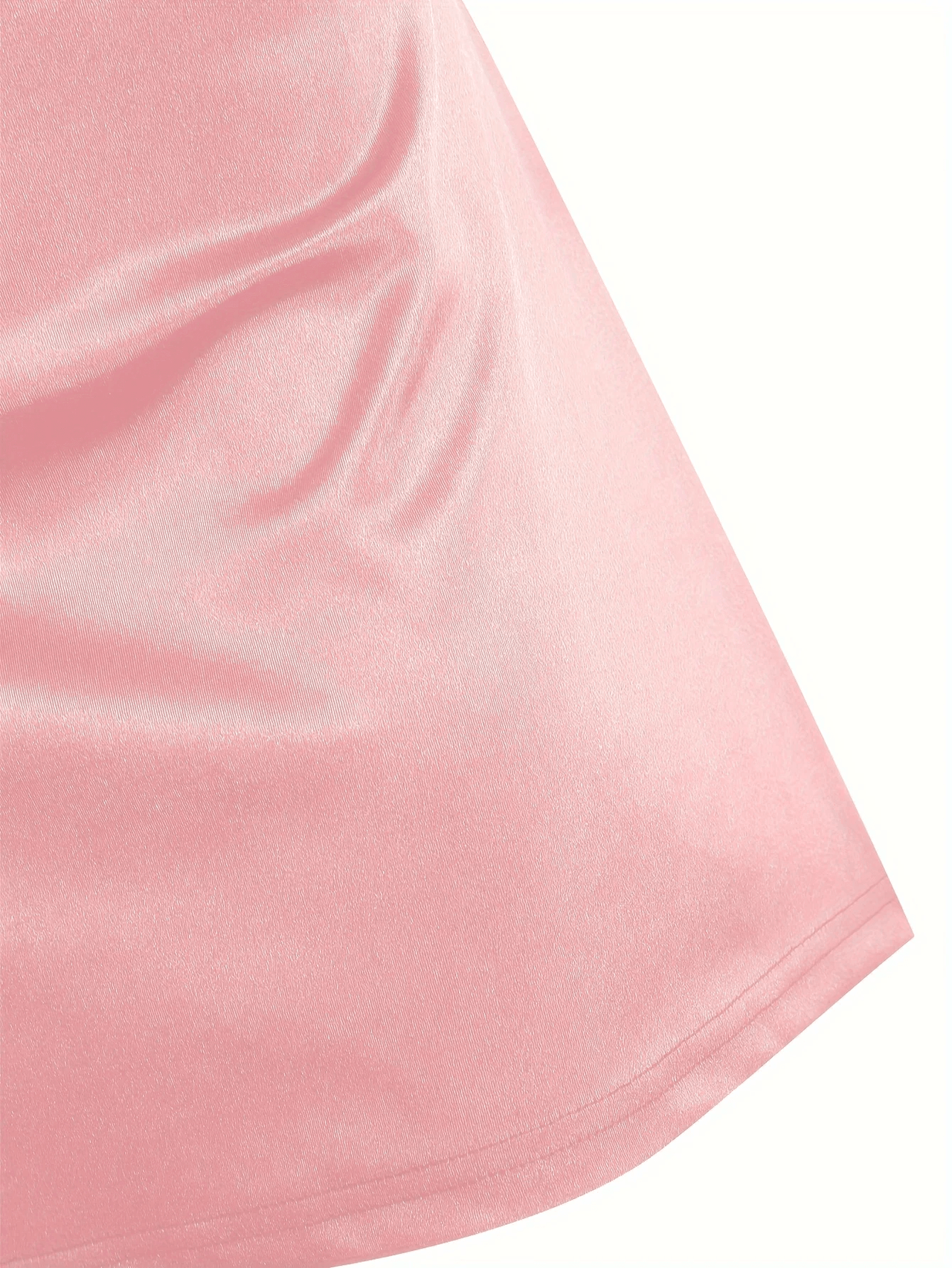 Close-up of a pink fabric texture on a white background