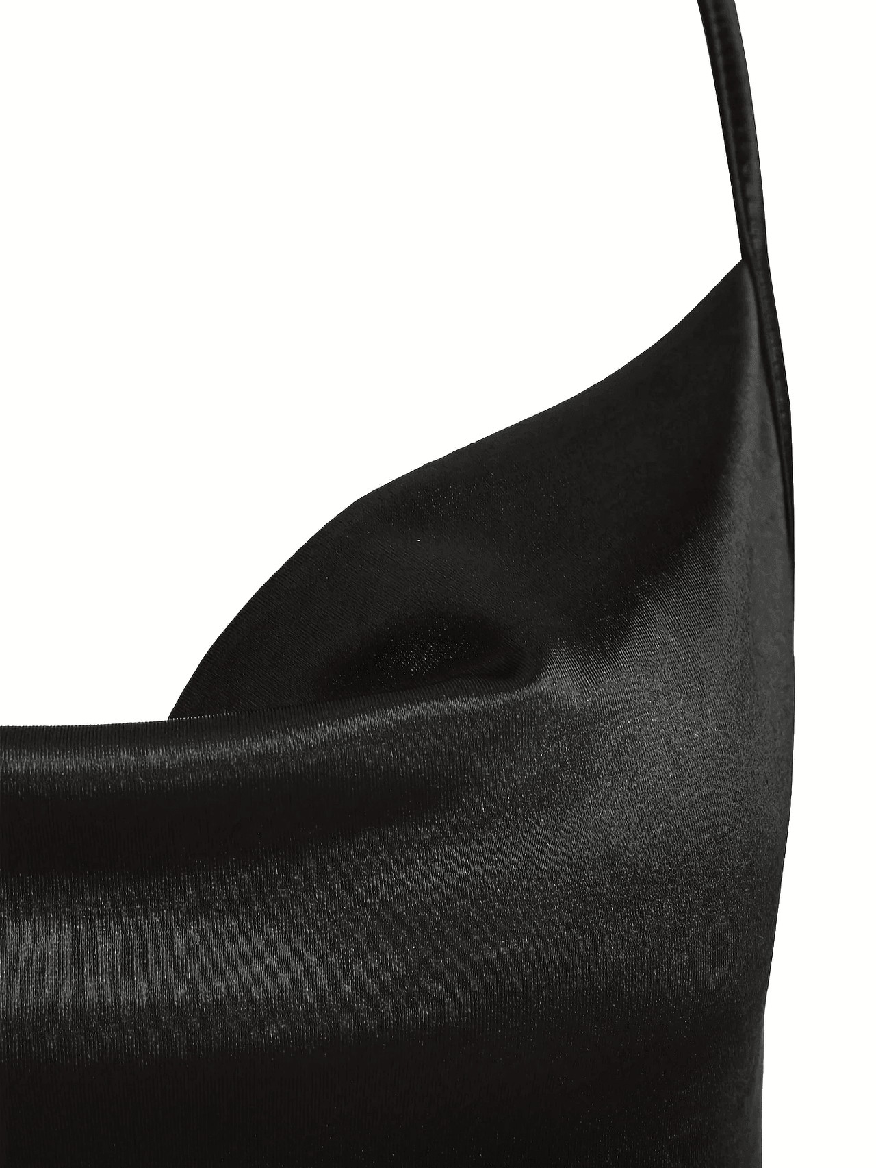 Close-up of a black satin fabric on a white background