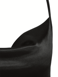 Thumbnail for Close-up of a black satin fabric on a white background
