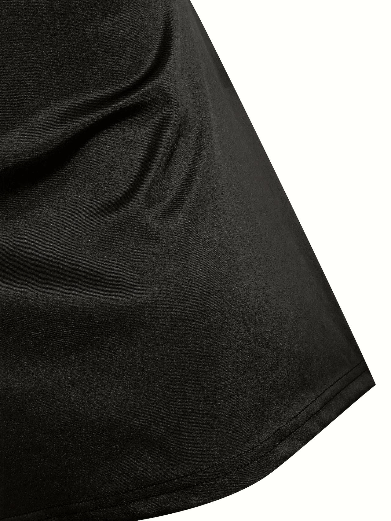 Close-up of a black fabric texture on a white background
