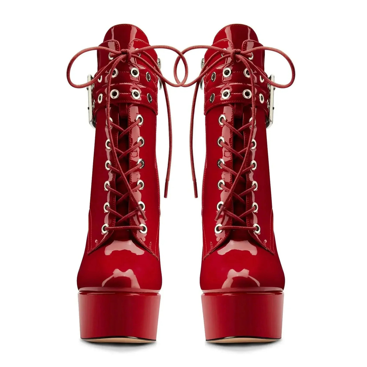 Pair of red platform boots with glossy finish on a white background