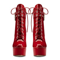 Thumbnail for Pair of red platform boots with glossy finish on a white background