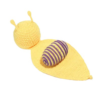 Thumbnail for Yellow and purple snail-shaped toy on a white background