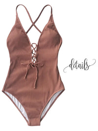 Thumbnail for Brown ribbed swimsuit with criss-cross straps on a white background
