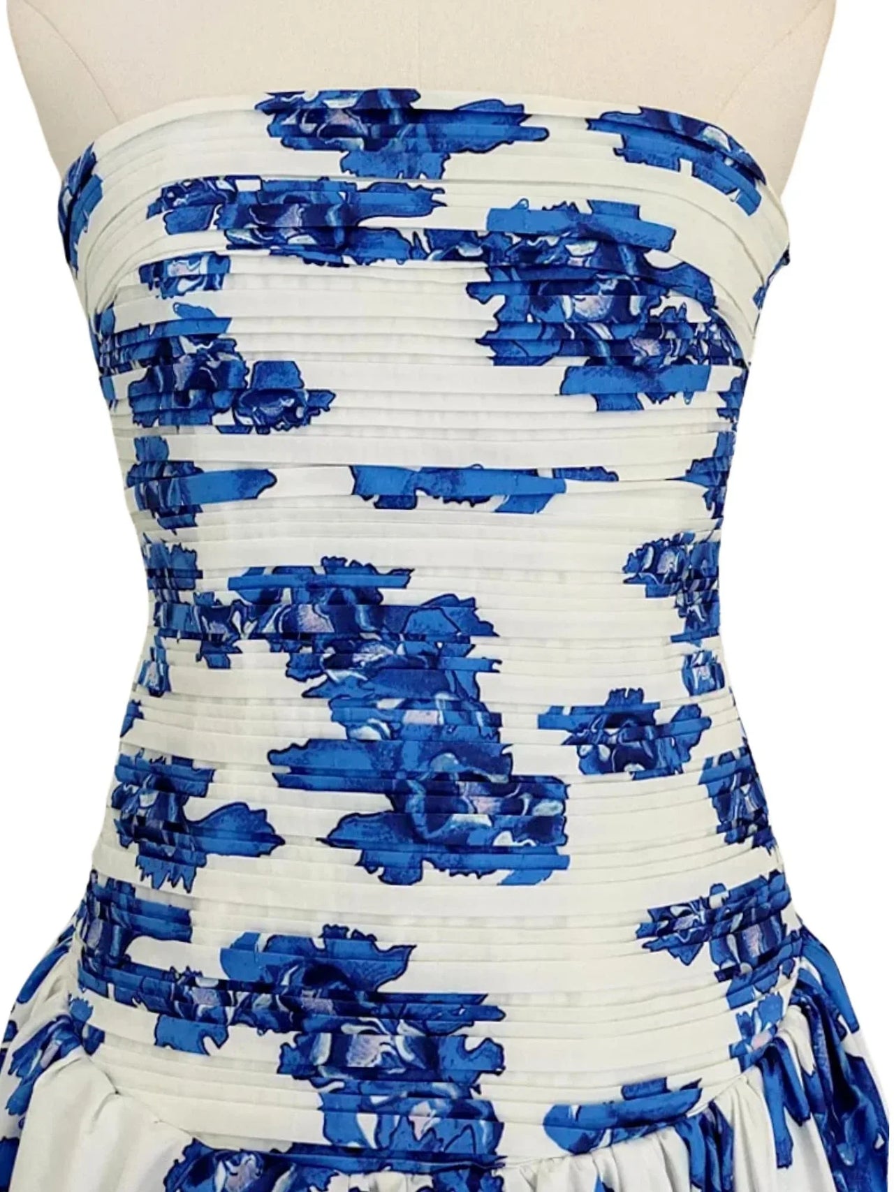 Blue floral strapless dress bodice on a mannequin.