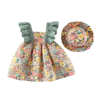 Thumbnail for Floral dress with green ruffled straps and matching floral hat on a white background