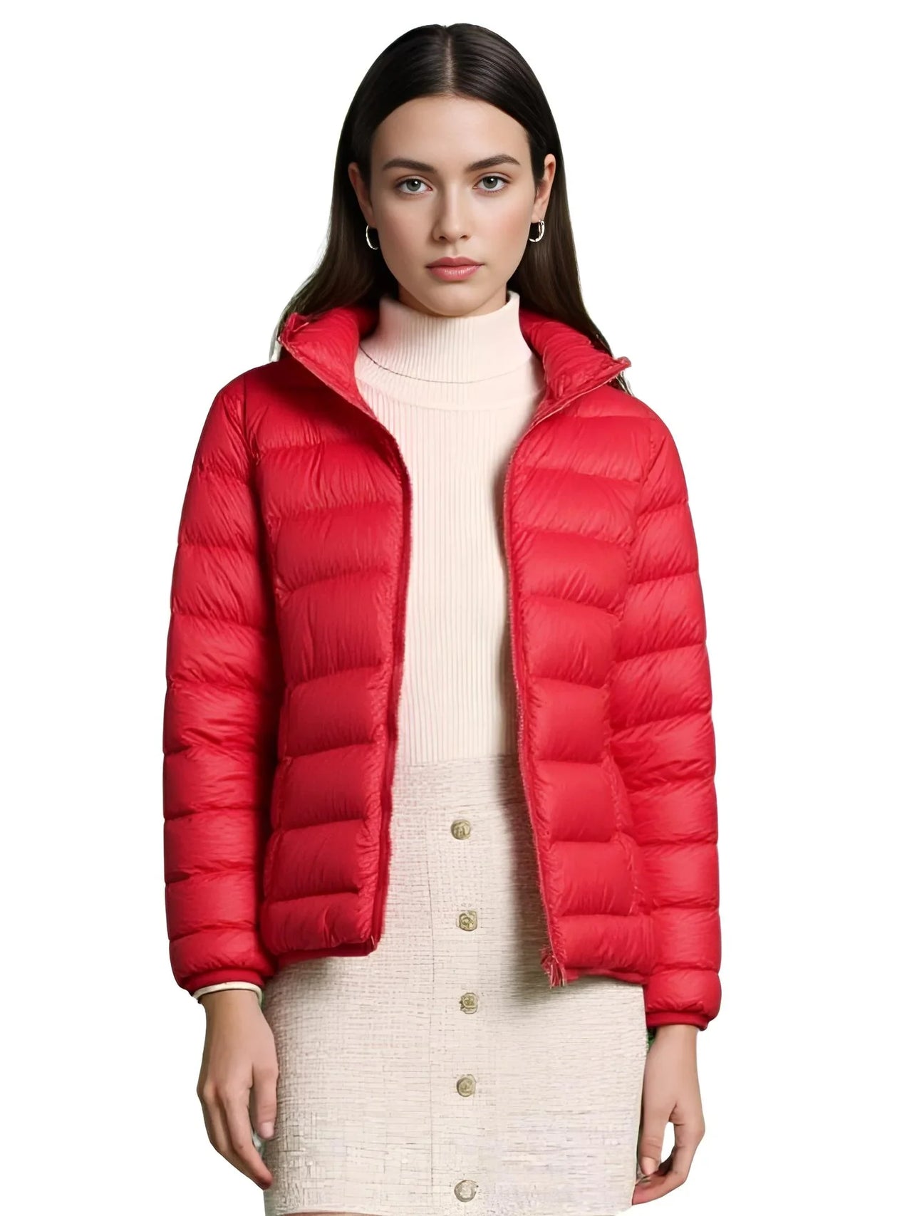Woman wearing a red puffer jacket over a cream outfit on a white background