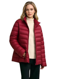 Thumbnail for Woman wearing a dark red duck down jacket on a white background