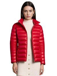 Thumbnail for Woman wearing a red puffer jacket on a white background