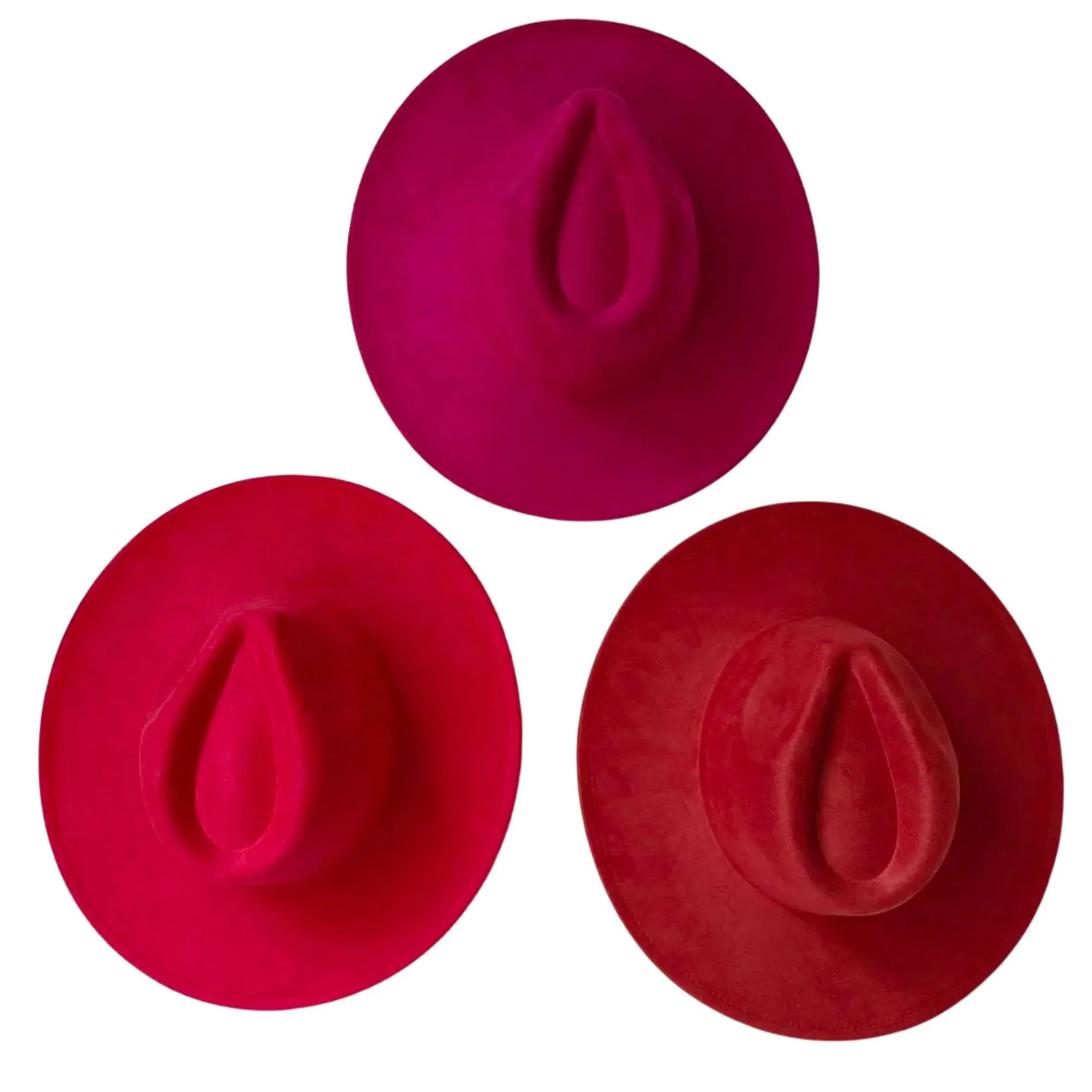 Three red and pink fedora hats on a white background