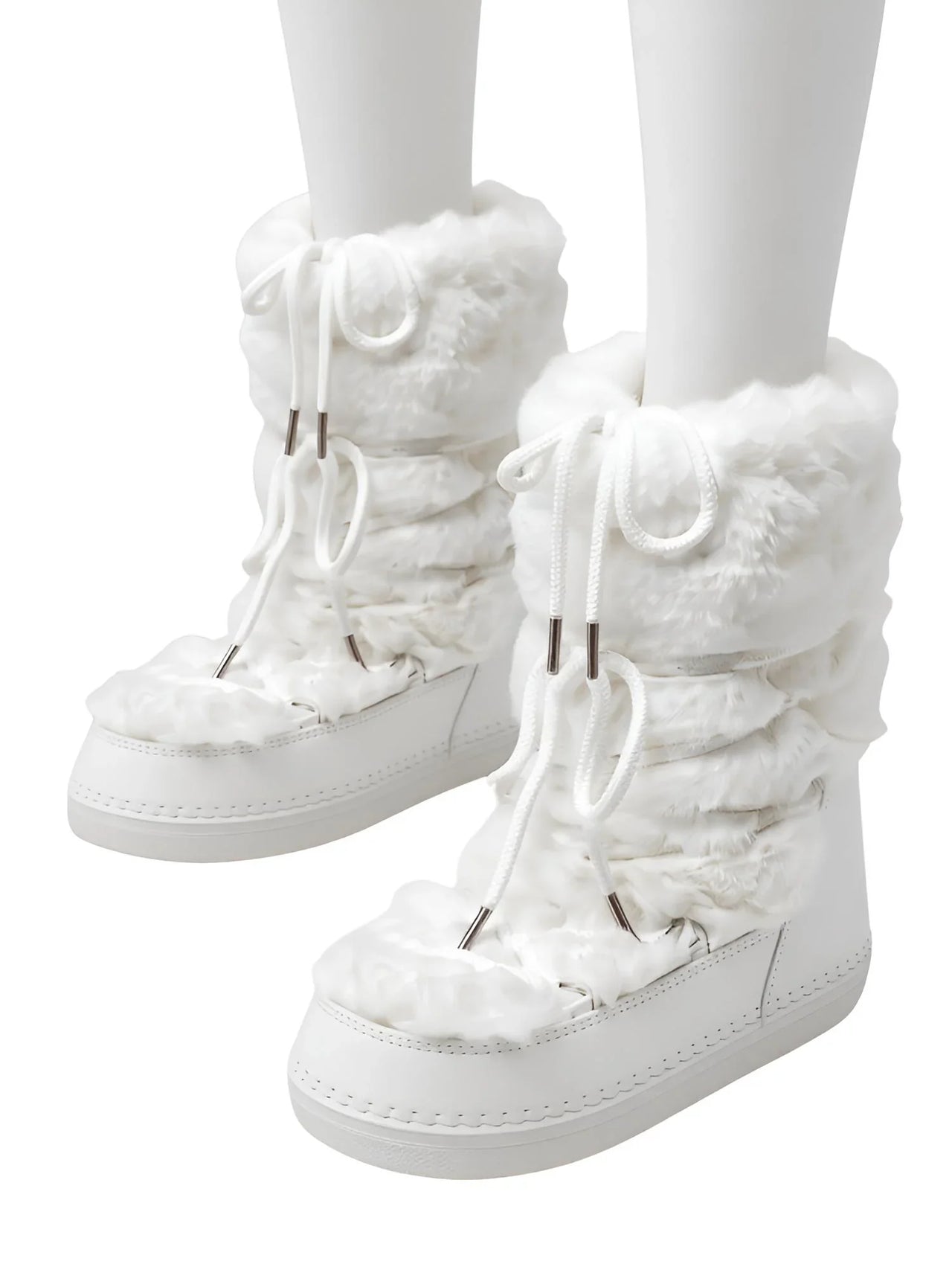 White winter boots with fur trim on a white background