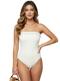 Thumbnail for Woman wearing a white strapless swimsuit on a white background