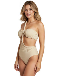 Thumbnail for Woman wearing a pale gold bikini on a white background