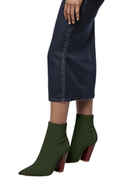 Thumbnail for Olive green ankle sock boots with brown soles worn with a dark denim skirt on a white background