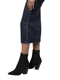 Thumbnail for Black ankle sock boots worn with a dark denim skirt on a white background