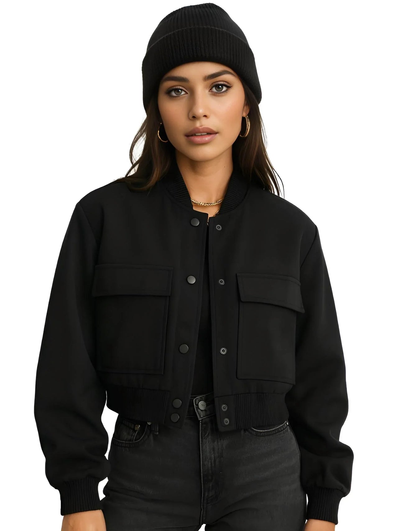 Woman wearing a black bomber jacket and beanie on a white background