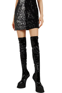 Thumbnail for Black thigh high platform boots worn with a black sequin dress on a white background
