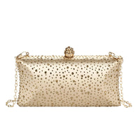 Thumbnail for Gold clutch bag with rhinestone embellishments on a white background