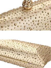 Thumbnail for Gold clutch bag with decorative studs on a white background