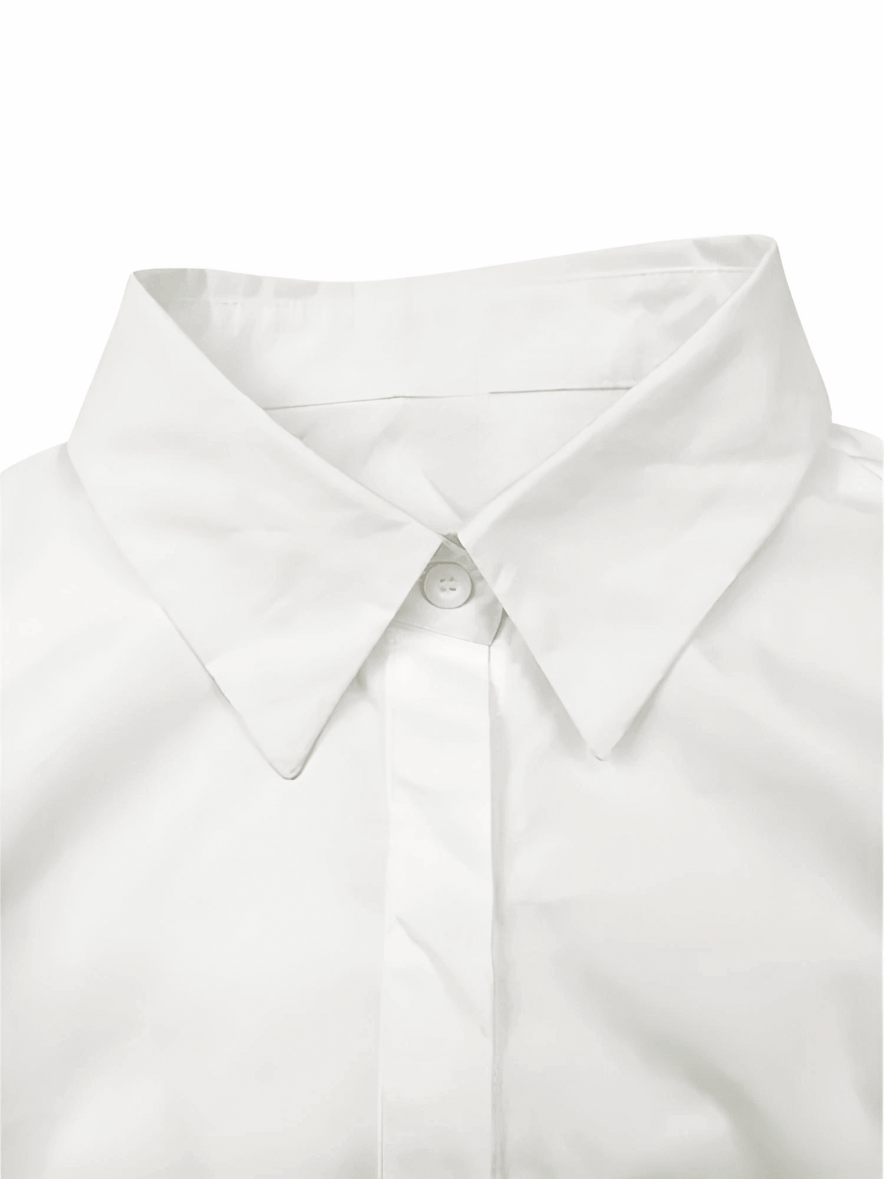 Close-up of a white shirt collar with a button on a white background