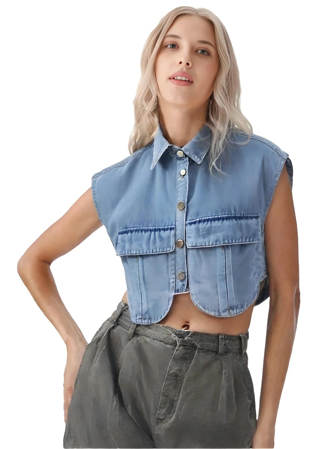 Woman wearing a sleeveless denim crop top on a white background