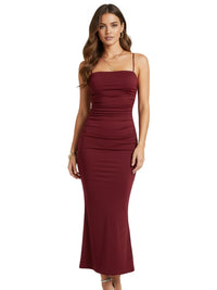 Thumbnail for Woman wearing a dark red tight dress on a white background
