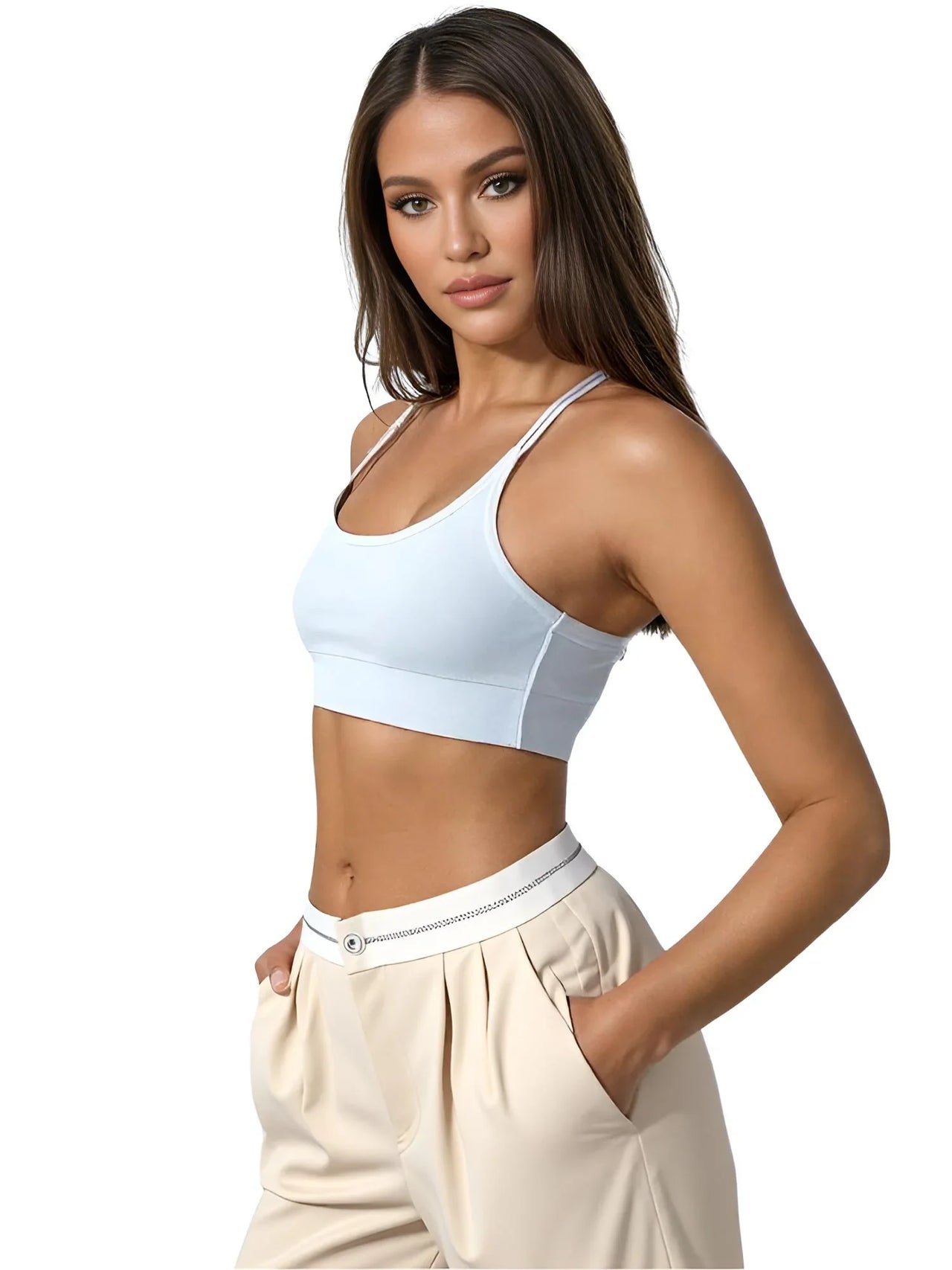 Woman wearing a light blue sports bra and beige pants on a white background