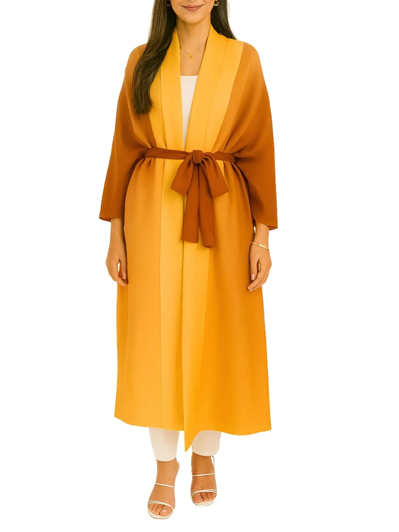 Woman wearing an orange long jacket with a belt on a white background