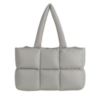 Thumbnail for Gray puffer bag on a white background