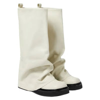 Thumbnail for White knee-high slouch boots with black soles on a white background