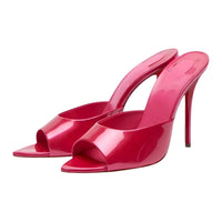 Thumbnail for Pair of bright pink high-heeled red sole shoes on a white background