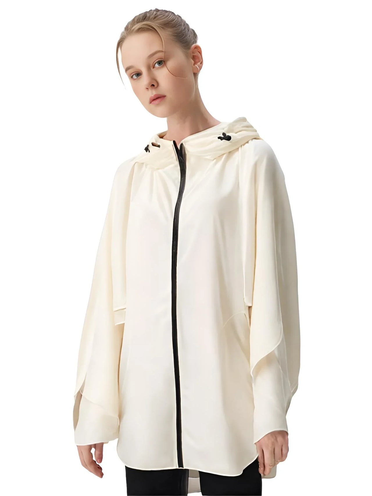 Person wearing a white hooded rain jacket with a black zipper on a white background