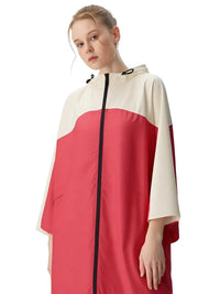 Thumbnail for Person wearing a pink and white raincoat on a white background