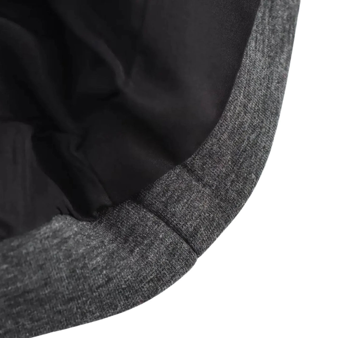 Close-up of a gray and black textured fabric edge