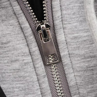 Thumbnail for Close-up of a zipper on a gray fabric background