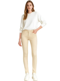 Thumbnail for Woman wearing a white sweater and khaki colored skinny jeans on a white background