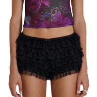 Thumbnail for Black tiered lace bloomer shorts worn with a colorful top on a white background