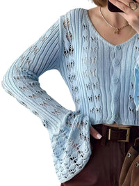 Thumbnail for Light blue knitted cardigan with lace details worn by a person on a white background